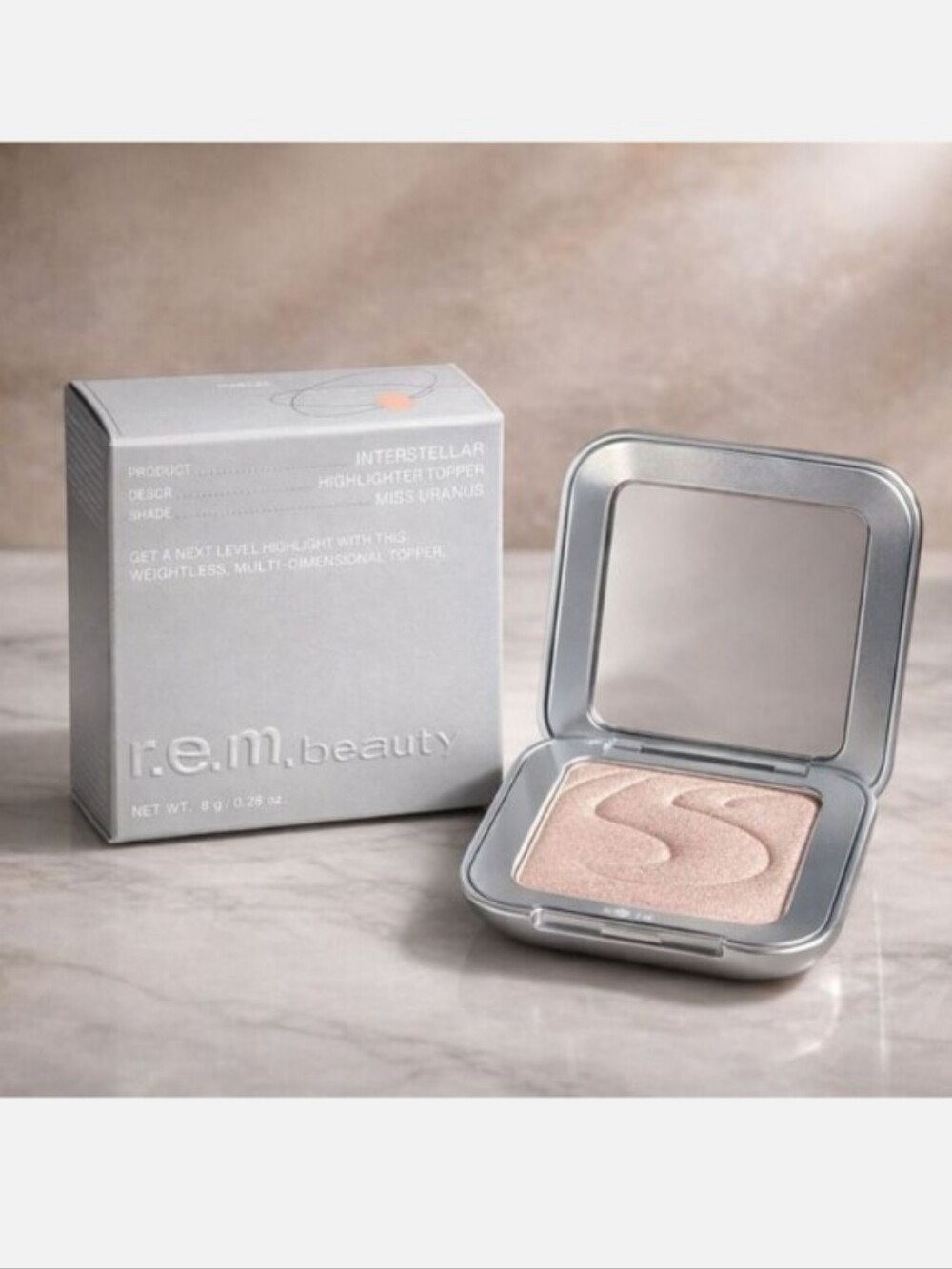 r.e.m. beauty Interstellaire Highlighter Top Coat - Miss Uranus